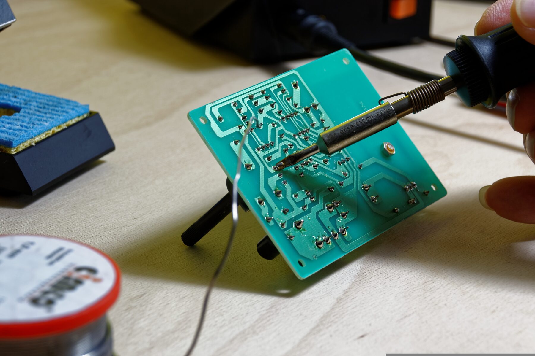 Microsoldering board-level repair under microscope